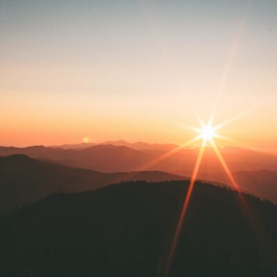 silhoutte of mountains during sunset