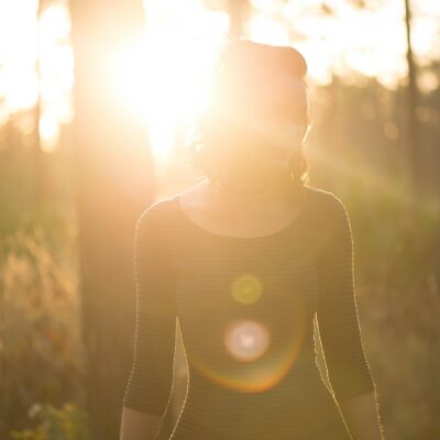 woman standing grass field