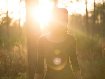 woman standing grass field